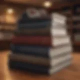 A stack of investment books on a wooden table